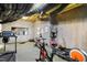 Basement home gym with modern equipment, offering a private space for workouts and fitness routines at 2613 Forest Lake Ct, Wake Forest, NC 27587