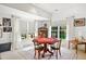 Bright game room with a chess table, natural light, and a large windows, perfect for Gathering fun at 2613 Forest Lake Ct, Wake Forest, NC 27587