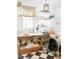 Charming laundry room featuring rustic wooden accents, modern appliances, and ample storage at 2613 Forest Lake Ct, Wake Forest, NC 27587