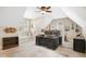 Spacious office featuring a large wooden desk, custom built-ins, and natural light, offering a comfortable workspace at 2613 Forest Lake Ct, Wake Forest, NC 27587