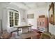 Bright office with hardwood floors, natural light, and vintage furnishings at 2613 Forest Lake Ct, Wake Forest, NC 27587