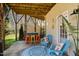 Outdoor covered patio with bar and seating at 2613 Forest Lake Ct, Wake Forest, NC 27587