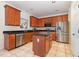 Spacious kitchen with stainless steel appliances, granite counters, and a central island at 2900 London Bell Dr, Raleigh, NC 27614