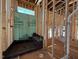 Unfinished bathroom showcases walk-in shower with seat and a glimpse of its layout at 2957 Wexford Pond Way, Wake Forest, NC 27587