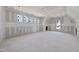 Spacious bedroom featuring unfinished drywall, multiple windows, and lots of natural light at 2957 Wexford Pond Way, Wake Forest, NC 27587