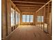 Unfinished bedroom provides a bright view through large windows and a glimpse of its layout at 2957 Wexford Pond Way, Wake Forest, NC 27587