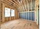 Bedroom framing featuring exposed beams and unfinished walls, offering a versatile space at 2957 Wexford Pond Way, Wake Forest, NC 27587