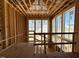 Bedroom framing showcasing open area, staircase and exposed construction for unique style at 2957 Wexford Pond Way, Wake Forest, NC 27587