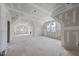 A large bonus room ready to be completed with lots of natural light at 2957 Wexford Pond Way, Wake Forest, NC 27587