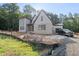 Striking two-story new construction home with brick and siding and an attached garage at 2957 Wexford Pond Way, Wake Forest, NC 27587