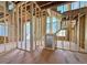 Unfinished interior with exposed framing and stair construction visible at 2957 Wexford Pond Way, Wake Forest, NC 27587