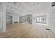 Spacious living room with hardwood floors, sliding glass doors and drywall in progress at 2957 Wexford Pond Way, Wake Forest, NC 27587