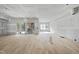 Spacious living room with hardwood floors, sliding glass doors and drywall in progress at 2957 Wexford Pond Way, Wake Forest, NC 27587