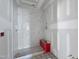 An unfinished shower featuring white tile walls and a tiled floor at 2957 Wexford Pond Way, Wake Forest, NC 27587