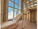 Exposed wood staircase under construction with a large window cluster at 2957 Wexford Pond Way, Wake Forest, NC 27587