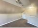 Bonus room offers lots of light with neutral decor and carpeting at 30 Wheat Dr, Angier, NC 27501