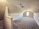 Bonus room offers lots of light with neutral decor and carpeting at 30 Wheat Dr, Angier, NC 27501