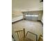 Bright garage featuring ample space, brick accents, and a stairway access for convenience at 30 Wheat Dr, Angier, NC 27501