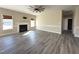Bright living room with a fireplace, neutral walls, and seamless flooring at 30 Wheat Dr, Angier, NC 27501