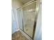 This bathroom features a shower stall with glass doors and neutral decor at 30 Wheat Dr, Angier, NC 27501