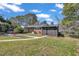 Spacious backyard featuring landscaping, a patio, and lush greenery at 300 Lakeside Dr, Garner, NC 27529
