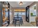 This dining area features a table with seating for four, a large window, and views to the kitchen at 300 Lakeside Dr, Garner, NC 27529