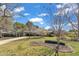 Well-maintained ranch-style home with a landscaped front yard and mature trees at 300 Lakeside Dr, Garner, NC 27529