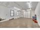 Spacious garage featuring utility sink, ample lighting, and work space at 300 Lakeside Dr, Garner, NC 27529