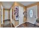 Hallway features hardwood floors, several doorways, and decorative art at 300 Lakeside Dr, Garner, NC 27529