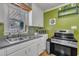Functional kitchen with stainless appliances, ample counter space and natural light at 300 Lakeside Dr, Garner, NC 27529
