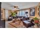 Cozy living room features two sofas, an area rug, a ceiling fan, curtains, and several lamps at 300 Lakeside Dr, Garner, NC 27529
