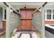 Unique outdoor shower with wood partition provides a spa-like experience in the backyard at 300 Lakeside Dr, Garner, NC 27529