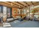 Relaxing covered patio features cozy seating and decor for outdoor enjoyment at 300 Lakeside Dr, Garner, NC 27529