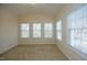 Bright bedroom with ample natural light and neutral carpet and fresh paint at 335 Bridgegate Dr, Cary, NC 27519