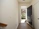 Bright foyer with tile flooring and view of the front yard through an open front door at 335 Bridgegate Dr, Cary, NC 27519