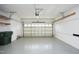 Spacious garage features an automatic garage door and ample storage at 335 Bridgegate Dr, Cary, NC 27519