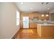 Kitchen with stainless appliances, granite counters, and a center island at 335 Bridgegate Dr, Cary, NC 27519