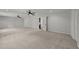 Large bonus room with carpet flooring, ceiling fans, and neutral paint at 3409 Lily Orchard Way, Apex, NC 27539