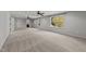 Bright bonus room with carpet, neutral paint, ceiling fans and backyard views at 3409 Lily Orchard Way, Apex, NC 27539