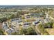 Aerial view of community featuring mature trees and abundant parking at 4011 Volkswalk Pl, Raleigh, NC 27610