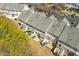 Aerial view of the back of townhomes and parking spots at 4011 Volkswalk Pl, Raleigh, NC 27610