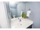 Cozy powder room with updated fixtures and a stylish, modern design at 4011 Volkswalk Pl, Raleigh, NC 27610