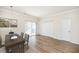 Dining area with a modern chandelier, and sliding door to the outdoor at 4011 Volkswalk Pl, Raleigh, NC 27610