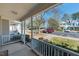 Cozy porch with views of the community, great for enjoying the outdoors at 4011 Volkswalk Pl, Raleigh, NC 27610