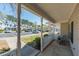 Relaxing porch seating area provides a peaceful outdoor living space in this townhome community at 4011 Volkswalk Pl, Raleigh, NC 27610