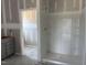 Bathroom featuring a new shower stall and vanity area, awaiting completion at 4013 Kingcraig Ln, Zebulon, NC 27597