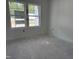 Bedroom features bright natural light and a large window at 4013 Kingcraig Ln, Zebulon, NC 27597