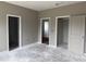 Spacious bedroom featuring multiple doorways and neutral paint, creating a versatile area ready for personalization at 4013 Kingcraig Ln, Zebulon, NC 27597