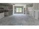 Bright, open-concept space with kitchen and living areas ready for final customization at 4013 Kingcraig Ln, Zebulon, NC 27597