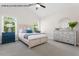 Serene bedroom features soft colors, neutral carpet, and comfortable furnishings at 4013 Kingcraig Ln, Zebulon, NC 27597